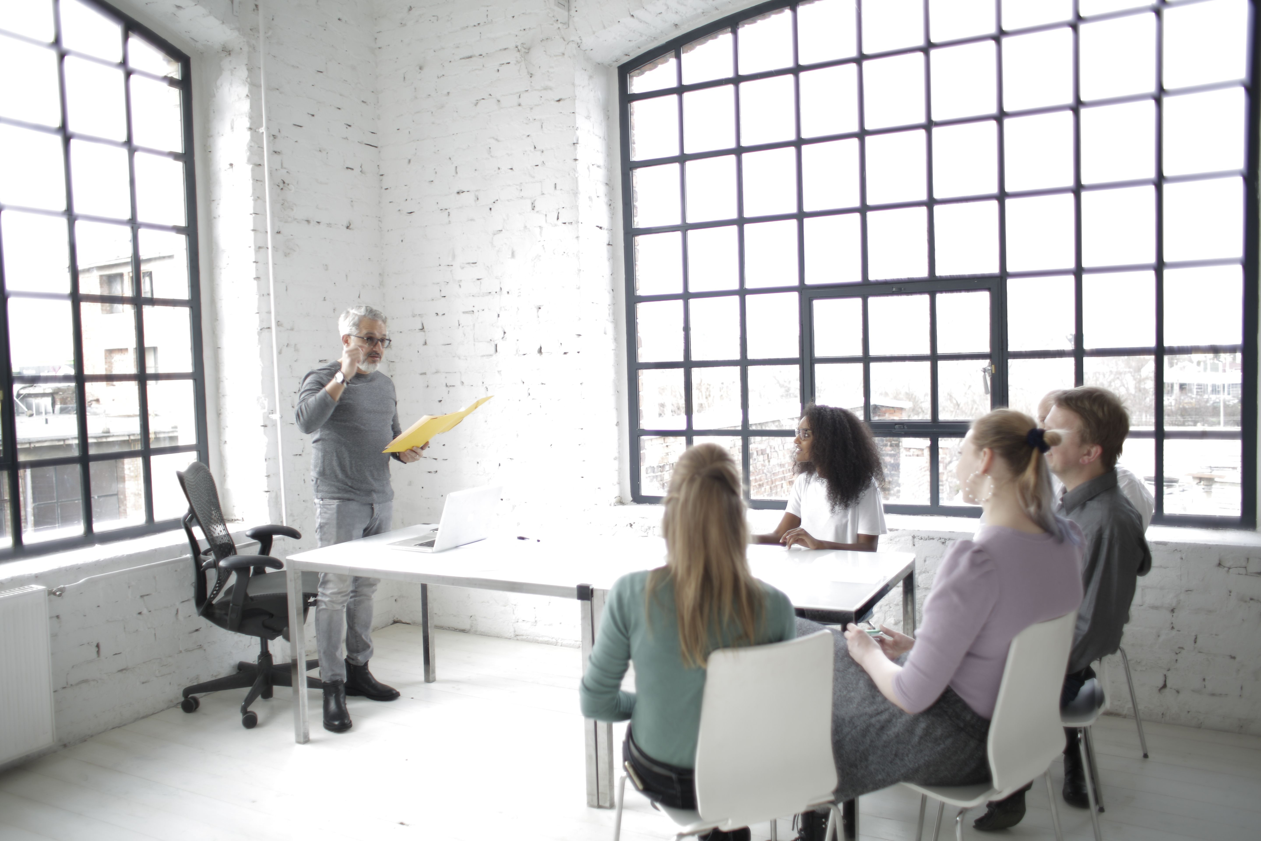 Career consultant guiding a professional group