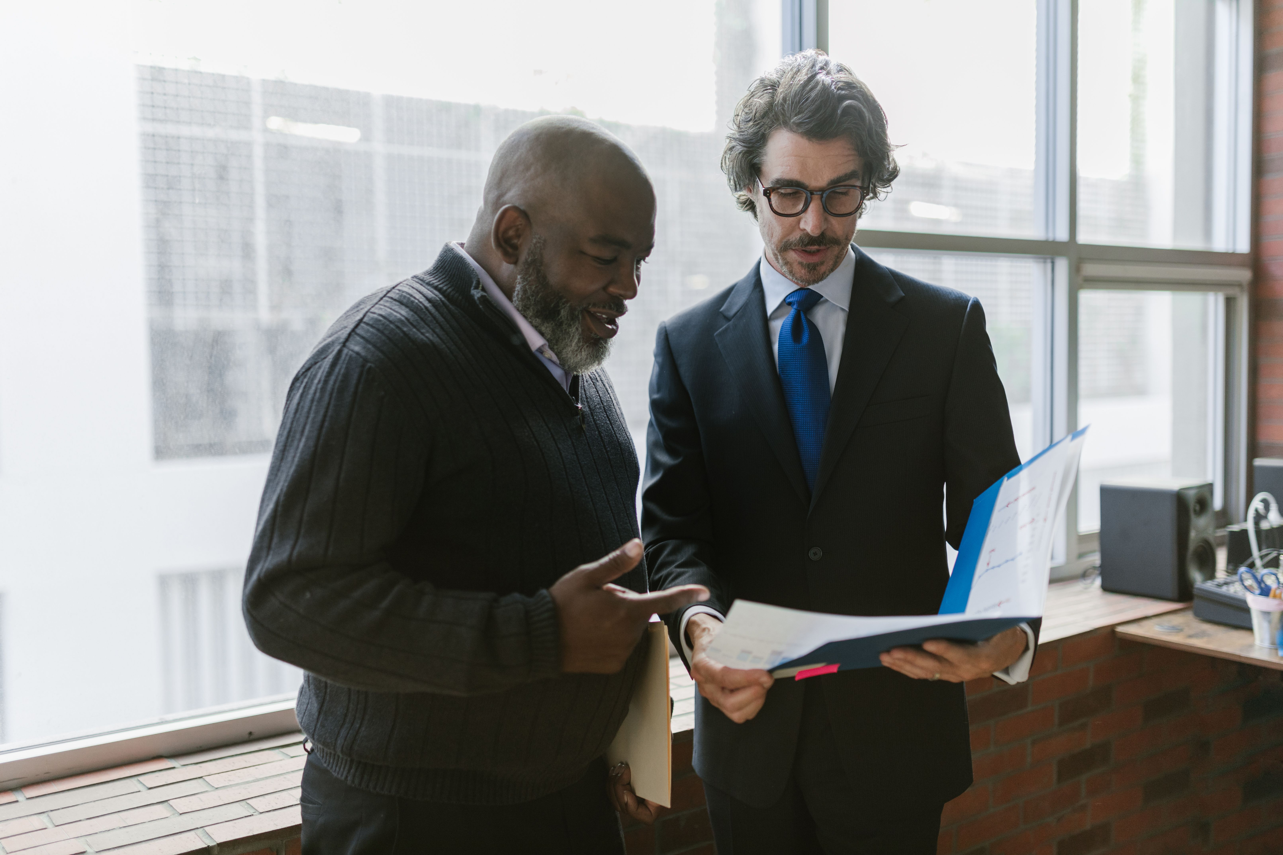 Career consultants reviewing documents